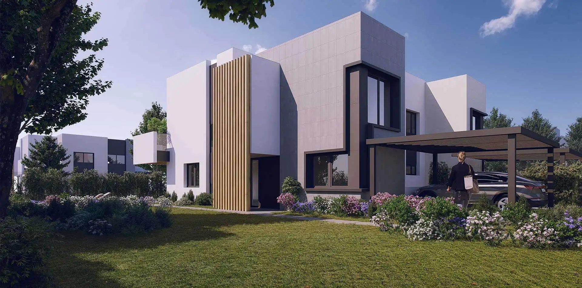 Jardín frontal de la vivienda pareada de la promoción iKasaClass Lantana en Pozuelo de Alarcón
