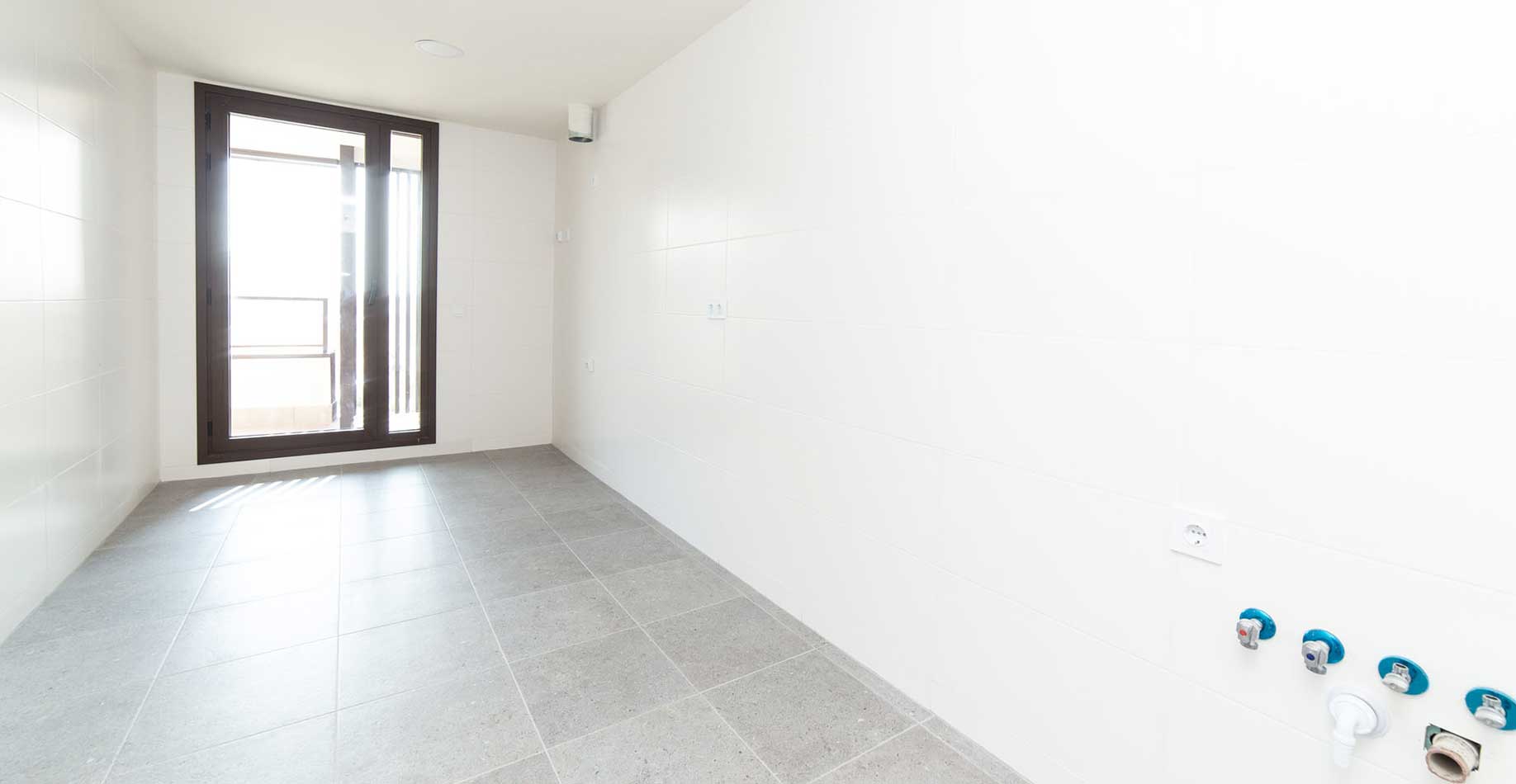 Cocina sin amueblar de una vivienda de la promoción iKasaClass Nuevo Tres Cantos