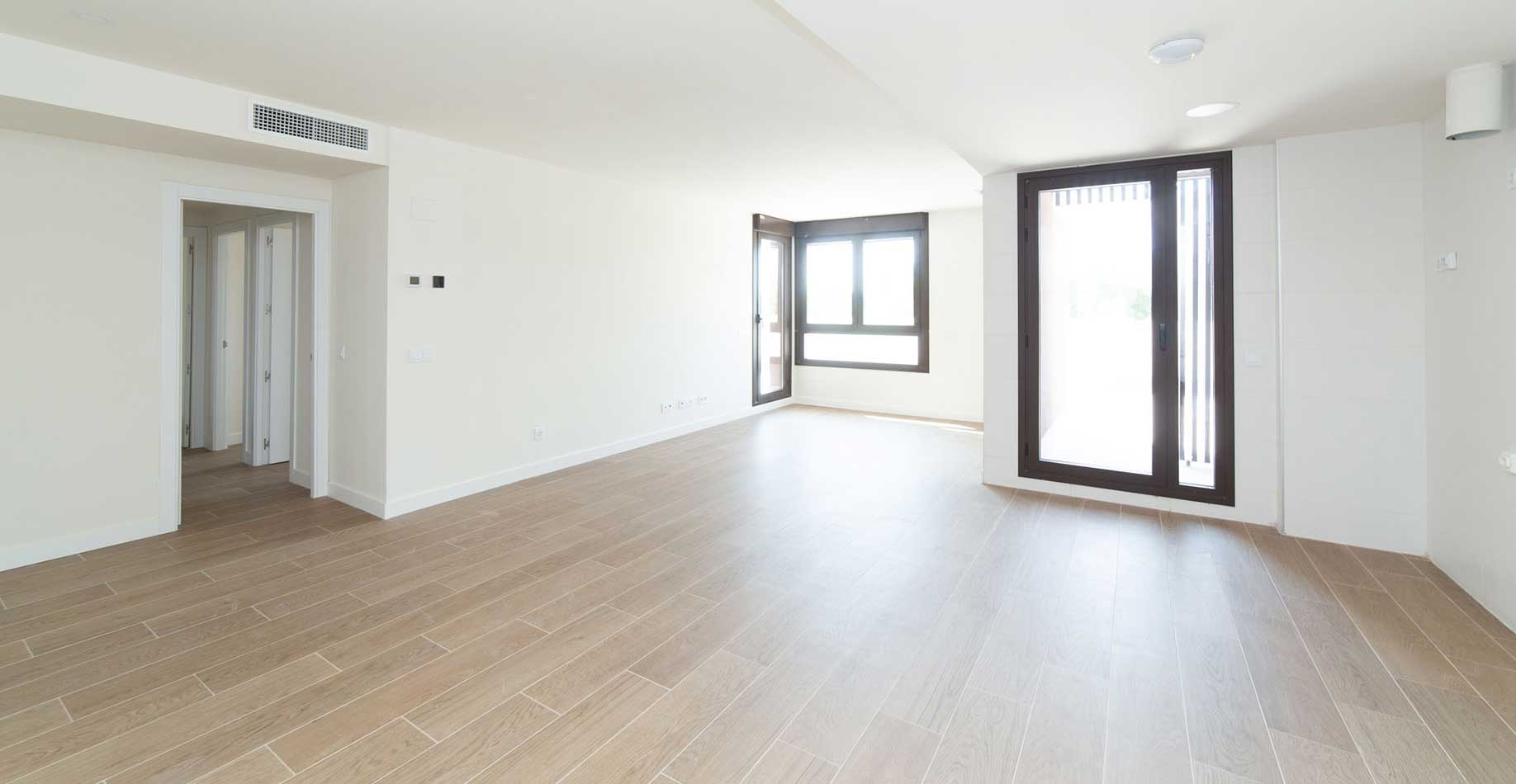 Amplio salón de una vivienda de la promoción iKasaClass Nuevo Tres Cantos