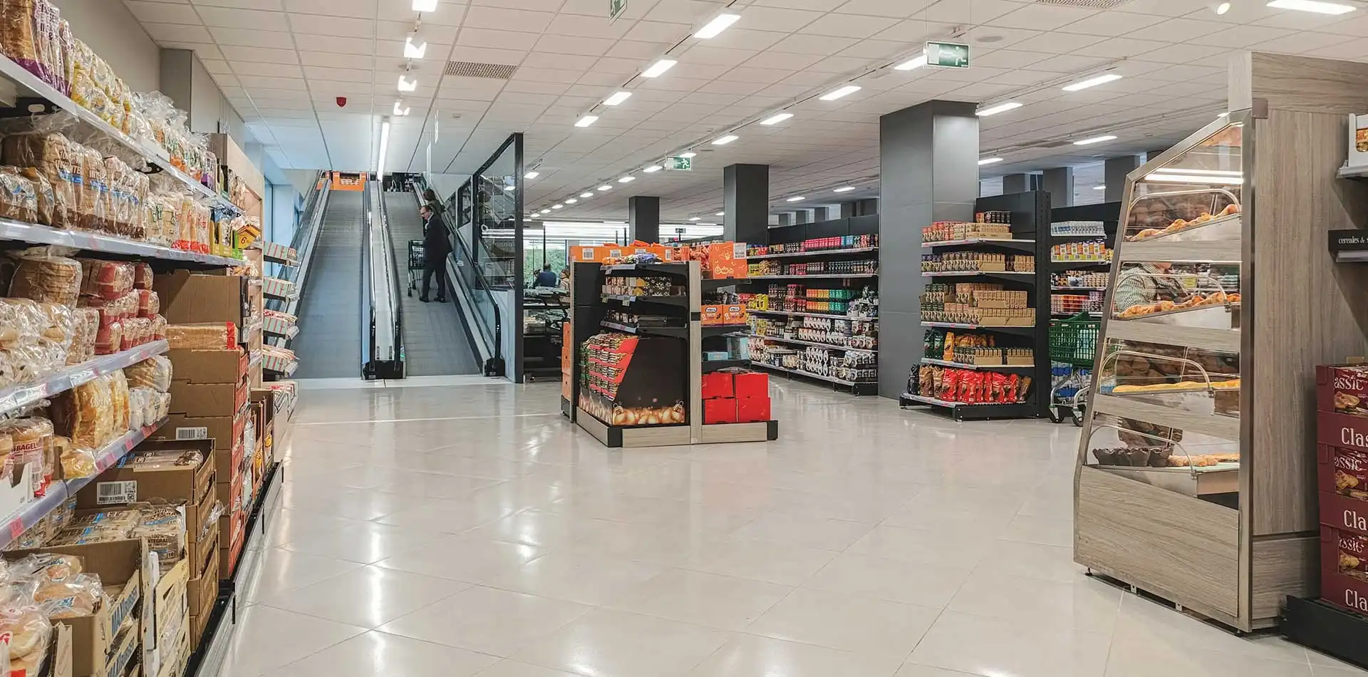 Escaleras mecánicas de subida y bajada en Supermercado Mercadona iKasa Burgosol